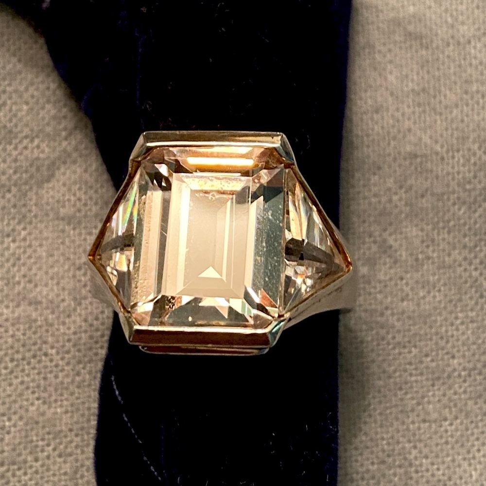 Bling!   Large Emerald cut CZ set in SS.
